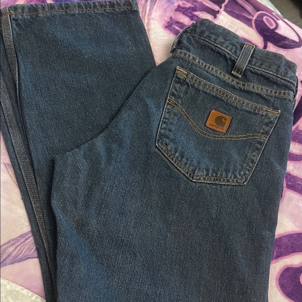 Carhartt Dark Indigo Denim Jeans with Logo Patch